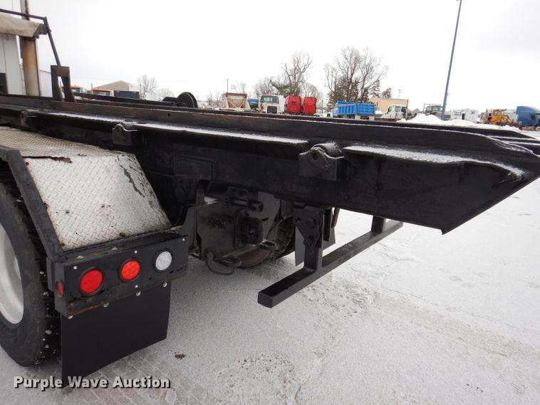 image for item JH9919 2004 Mack Granite CV700  roll-off container truck