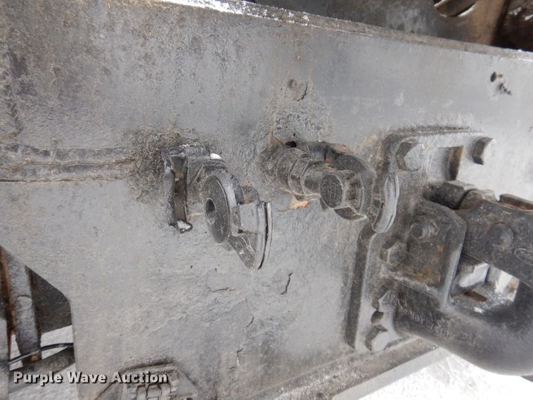 image for item JH9919 2004 Mack Granite CV700  roll-off container truck