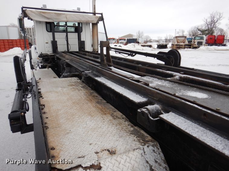 image for item JH9919 2004 Mack Granite CV700  roll-off container truck