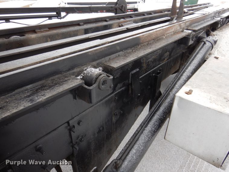 image for item JH9919 2004 Mack Granite CV700  roll-off container truck