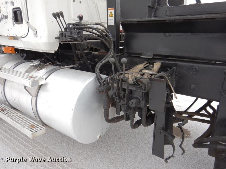 image for item JH9919 2004 Mack Granite CV700  roll-off container truck