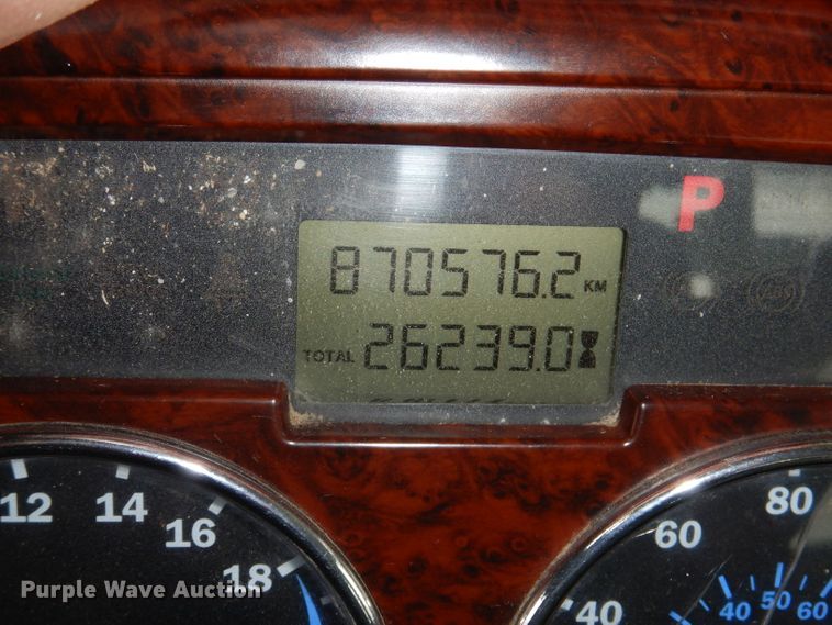 image for item JH9919 2004 Mack Granite CV700  roll-off container truck