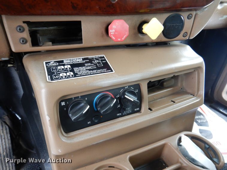 image for item JH9919 2004 Mack Granite CV700  roll-off container truck