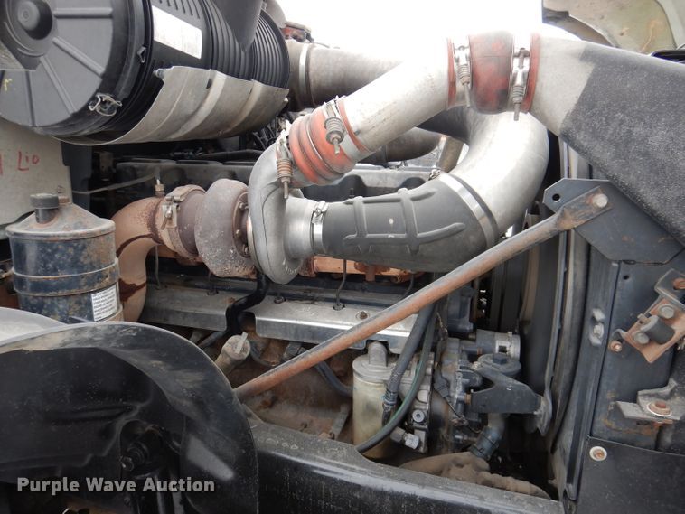 image for item JH9919 2004 Mack Granite CV700  roll-off container truck