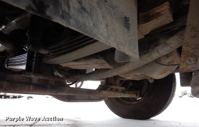 image for item JH9919 2004 Mack Granite CV700  roll-off container truck