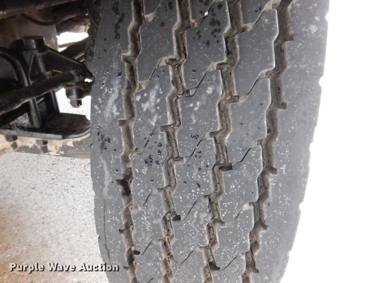 image for item JH9919 2004 Mack Granite CV700  roll-off container truck