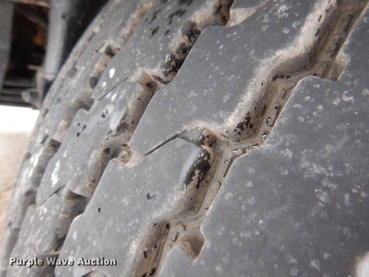 image for item JH9919 2004 Mack Granite CV700  roll-off container truck