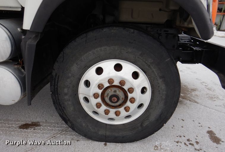 image for item JH9919 2004 Mack Granite CV700  roll-off container truck