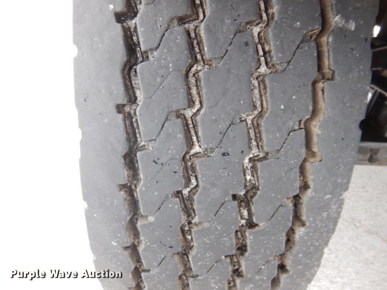 image for item JH9919 2004 Mack Granite CV700  roll-off container truck