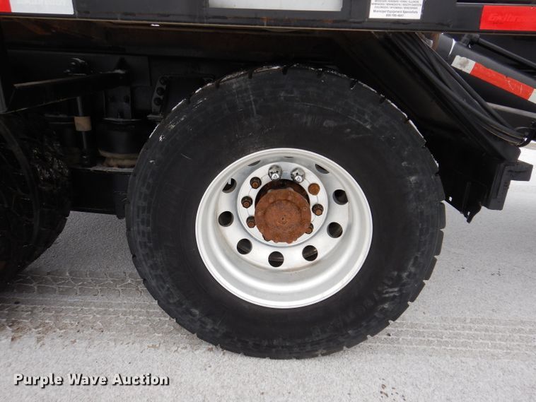 image for item JH9919 2004 Mack Granite CV700  roll-off container truck