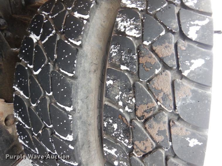 image for item JH9919 2004 Mack Granite CV700  roll-off container truck