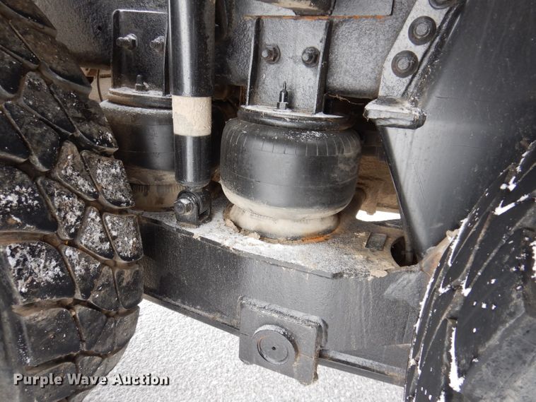 image for item JH9919 2004 Mack Granite CV700  roll-off container truck