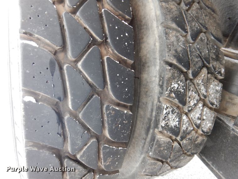 image for item JH9919 2004 Mack Granite CV700  roll-off container truck