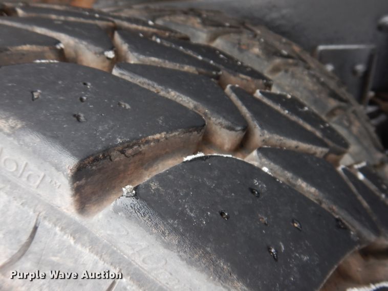 image for item JH9919 2004 Mack Granite CV700  roll-off container truck