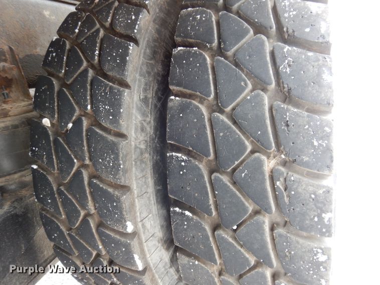 image for item JH9919 2004 Mack Granite CV700  roll-off container truck