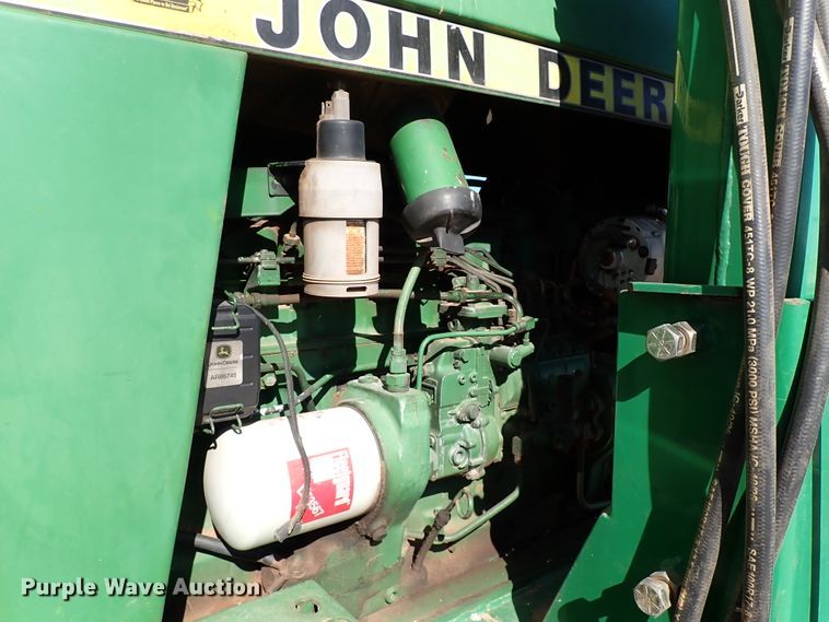 image for item IS9417 1988 John Deere 4450  MFWD tractor