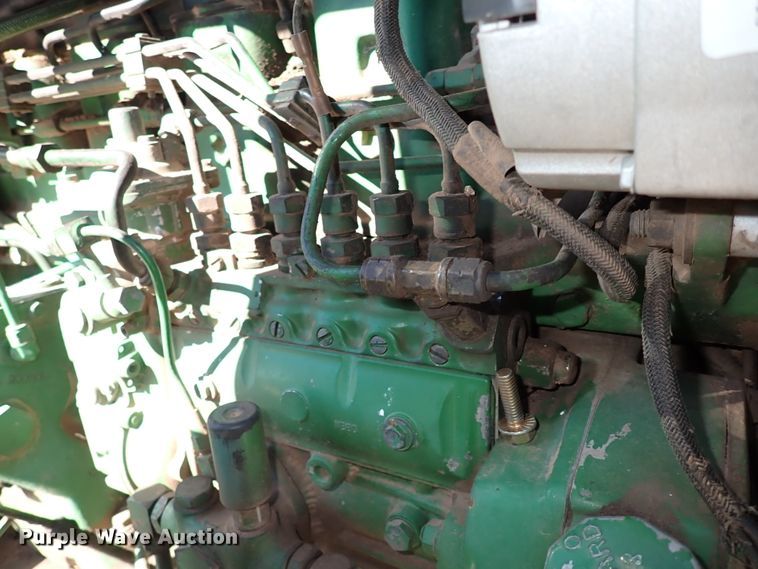 image for item IS9417 1988 John Deere 4450  MFWD tractor