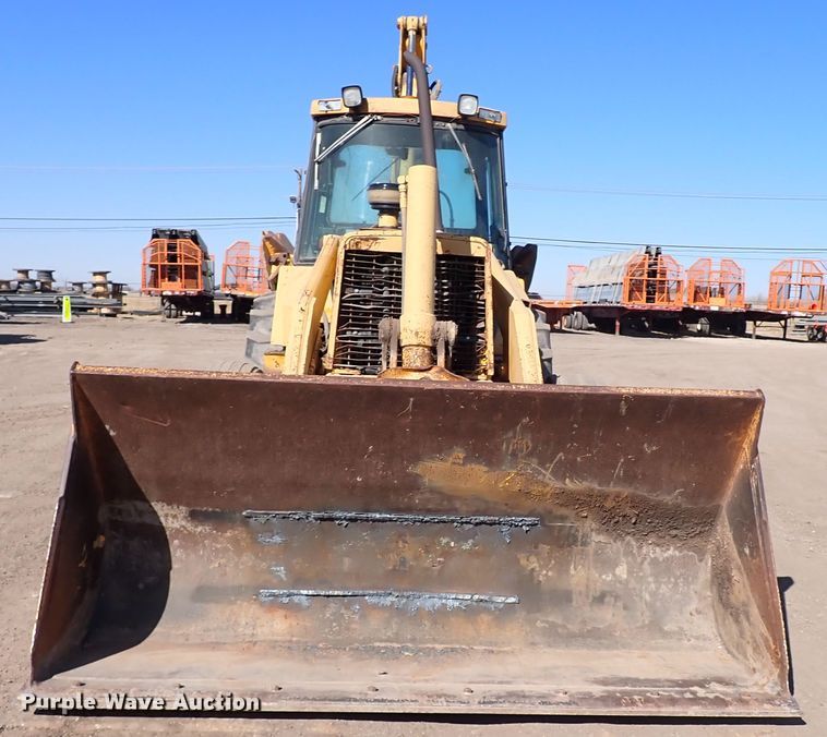 image for item IS9466 1989 John Deere 710C  backhoe