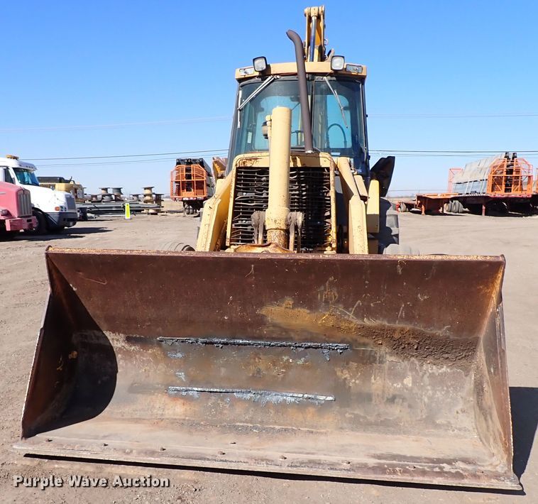 image for item IS9466 1989 John Deere 710C  backhoe