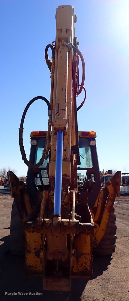 image for item IS9466 1989 John Deere 710C  backhoe