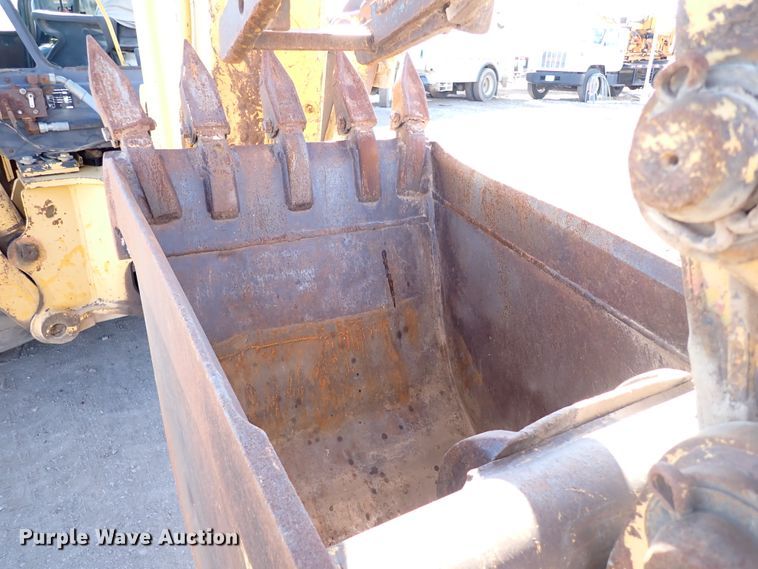 image for item IS9466 1989 John Deere 710C  backhoe