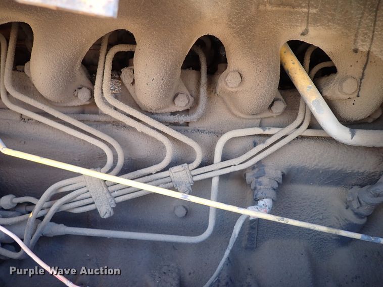 image for item IS9466 1989 John Deere 710C  backhoe