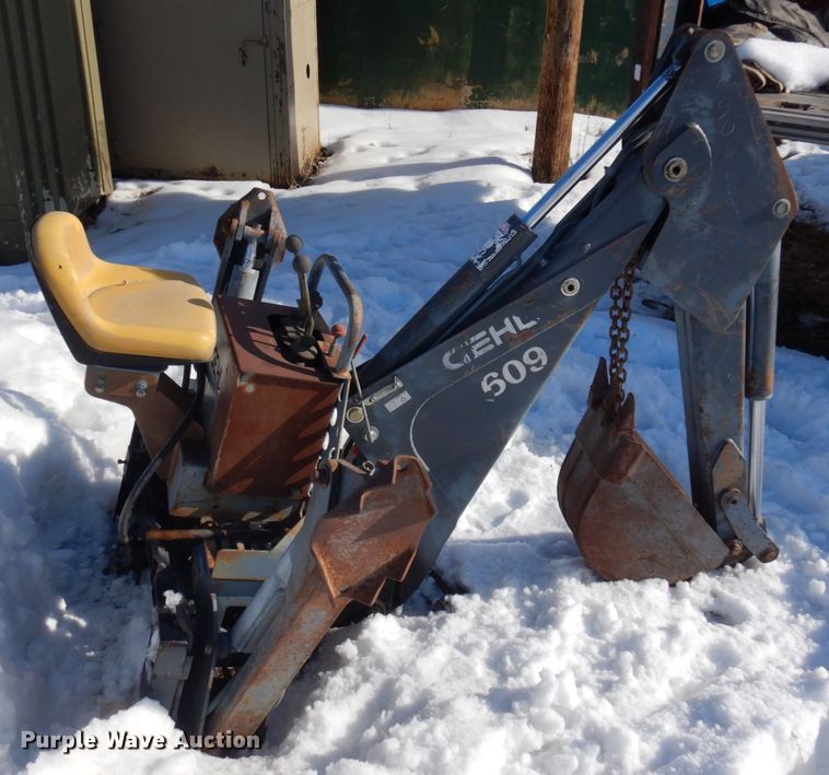 image for item KE9289 Gehl 609  skid steer backhoe