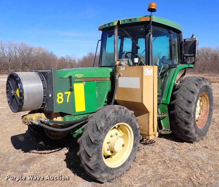 image for item DC4111 2001 John Deere 6410  MFWD tractor