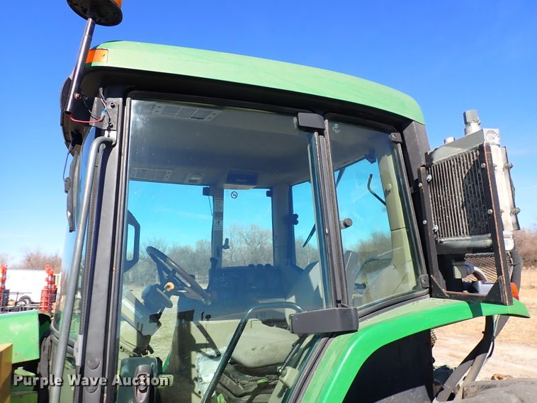 image for item DC4111 2001 John Deere 6410  MFWD tractor