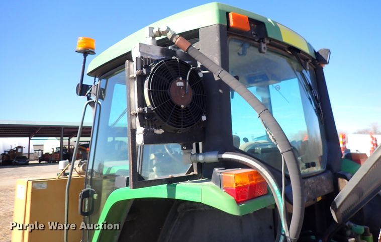 image for item DC4111 2001 John Deere 6410  MFWD tractor