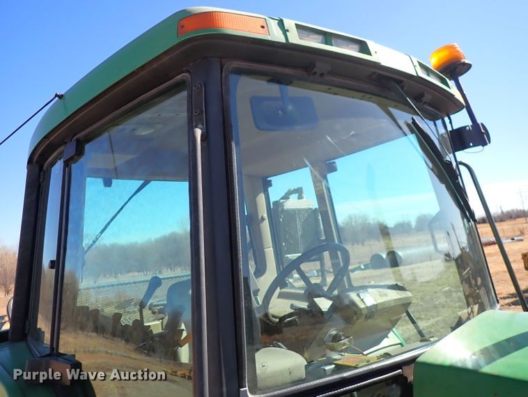 image for item DC4111 2001 John Deere 6410  MFWD tractor