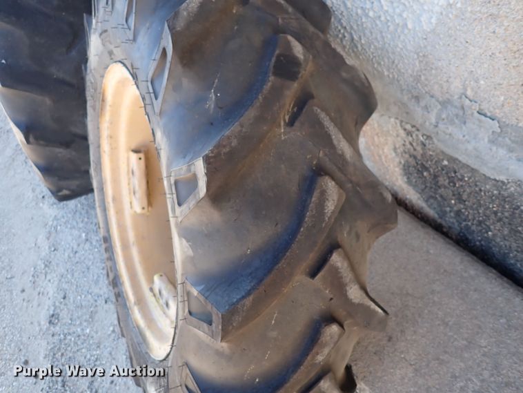 image for item DC4111 2001 John Deere 6410  MFWD tractor