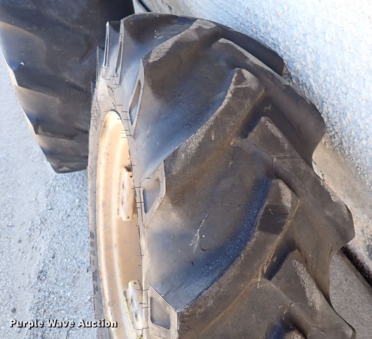 image for item DC4111 2001 John Deere 6410  MFWD tractor