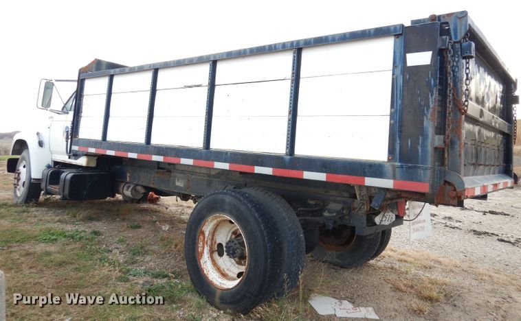 image for item DK3028 1998 Ford F700  dump flatbed truck