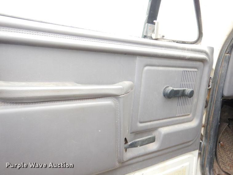 image for item DK3028 1998 Ford F700  dump flatbed truck