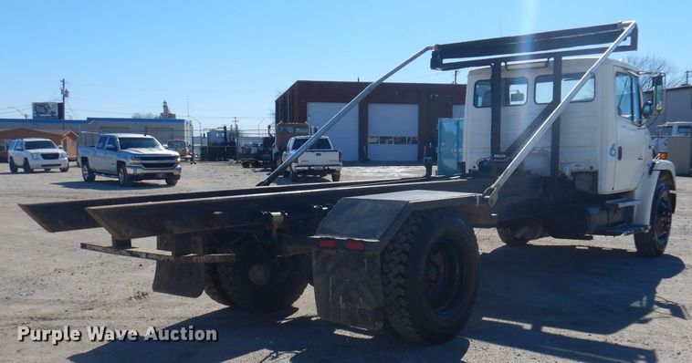 image for item DJ3812 1997 Freightliner FL70  roll-off container truck