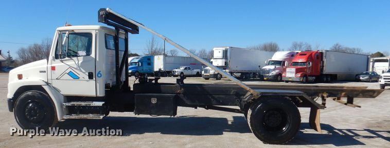 image for item DJ3812 1997 Freightliner FL70  roll-off container truck