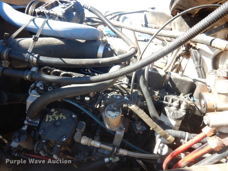 image for item DJ3812 1997 Freightliner FL70  roll-off container truck