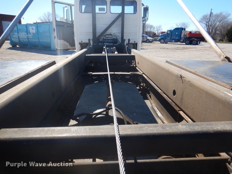 image for item DJ3812 1997 Freightliner FL70  roll-off container truck