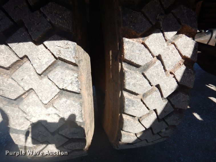 image for item DJ3812 1997 Freightliner FL70  roll-off container truck