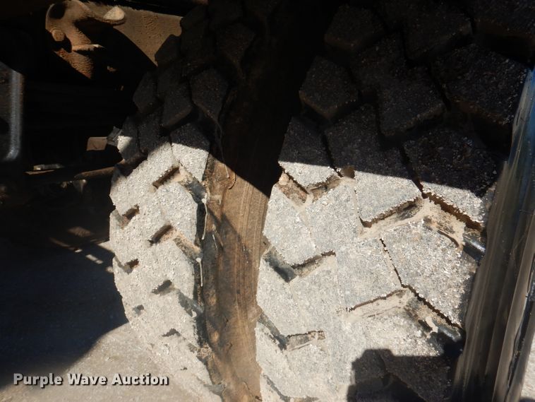 image for item DJ3812 1997 Freightliner FL70  roll-off container truck