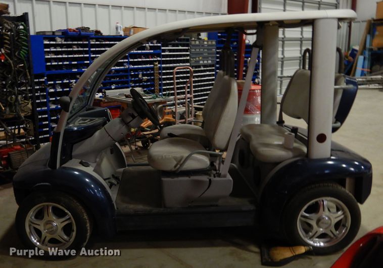 image for item DI8689 2002 Ford Think  golf cart