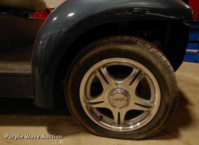 image for item DI8689 2002 Ford Think  golf cart