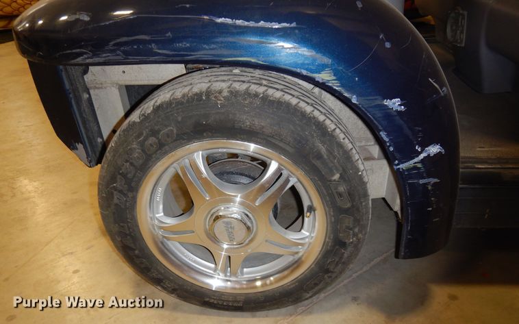 image for item DI8689 2002 Ford Think  golf cart