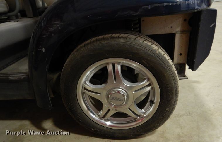 image for item DI8689 2002 Ford Think  golf cart