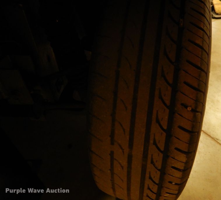 image for item DI8689 2002 Ford Think  golf cart