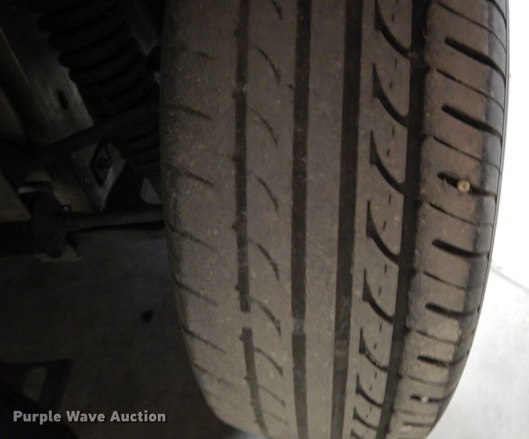 image for item DI8689 2002 Ford Think  golf cart