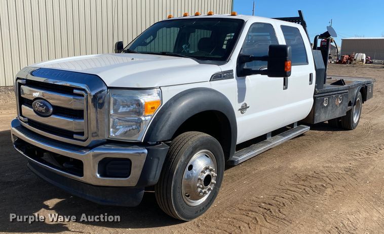 image for item DM8258 2015 Ford F550 Super Duty XL  Crew Cab flatbed truck