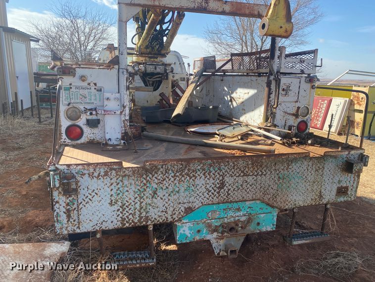 image for item DM8293 1988 GMC C6000  digger derrick truck