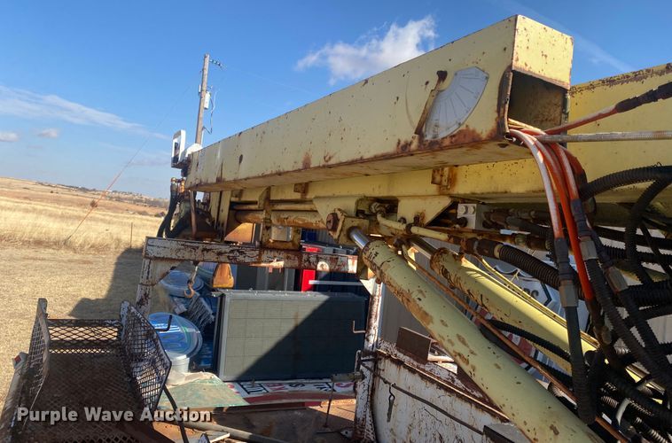 image for item DM8293 1988 GMC C6000  digger derrick truck